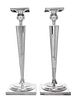 * A Pair of American Silver Candlesticks, , on square bases and with tapered fluted stems, weighted