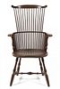 * An American Painted Comb-Back Windsor Chair, MODERN, Height 44 1/2 inches.