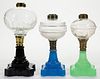 ASSORTED BAROQUE BASE GLASS KEROSENE STAND LAMPS, LOT OF THREE,