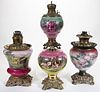 ASSORTED DECORATED GONE WITH THE WIND KEROSENE PARLOR LAMP BASES, LOT OF FOUR