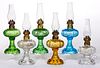 DAISY MINIATURE FOOTED FINGER AND STAND LAMPS, LOT OF SIX