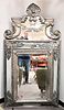 A Baroque Style Silvered Cast-Metal Mirror