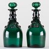 Pair of Emerald Glass Decanters and Stoppers Decorated with Raspberry Prunts