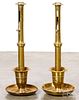 Pair of large brass push-up candlesticks, 19th c.