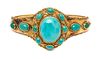 A Yellow Gold and Turquoise Bangle Bracelet, 20.70 dwts.