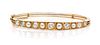A Yellow Gold, Diamond and Pearl Bangle Bracelet, 9.30 dwts.