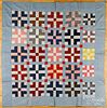 Nine-patch variant patchwork quilt, dated 1932