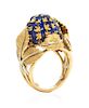 An 18 Karat Bicolor Gold and Sapphire Bombe Ring, Italian, 7.80 dwts.