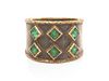 A Bicolor Gold and Emerald Ring, 5.30 dwts.