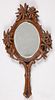 Intricately carved hand mirror, ca. 1900