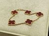Van Cleef & Arpels Vintage Alhambra bracelet, 5 motifs. 18k Yellow gold, Carnelian.