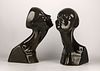 Pair of enameled ceramic head sculptures. Made in France