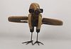 Bird made of wood and recycled metal by the artist David Klauser