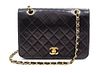 * A Chanel Black Quilted Flap Handbag, 8.5" x 6" x 2"