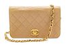* A Chanel Tan Quilted Flap Handbag, 7.5" x 4.5" x 1.5".