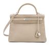 * An Hermes Taupe Kelly Bag 12 1/2" x 8 1/2" x 4 1/2".