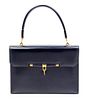 * An Hermes Navy Leather Handbag, 10 1/2" x 7 1/2" x 2".