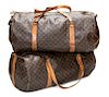 A Pair of Louis Vuitton Large Duffle Bags, 27.5" x 14" x 15"