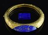 Lapis and gold bangle by Kutchinsky, 1970's  polished lapis to the centre on a 18 ct gold hinged bangle with a textured finis