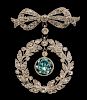 Edwardian wreath and bow brooch, with diamonds in  white gold milgrain setting and central blue zircon drop, 3 cm,  in Asprey