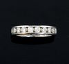 Tiffany and Co diamond full eternity ring, set with round brilliant cut diamonds in a channel setting mounted in platinum. Es