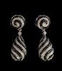 Pair of black and white diamond drop earrings in a swirl design mounted in 18 ct white gold.  Length 3.6 cm