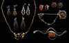 A collection of amber jewellery, mainly silver settings, including a large brooch signed PB