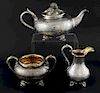 Victorian silver three piece tea service, comprising teapot, cream jug and sugar bowl, with engraved scrolling foliate decora