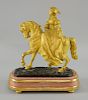 Late 19th century gilt bronze casting of a woman in formal dress riding side saddle. 23cm High