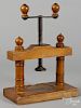 Fruitwood and wrought iron juice press, 19th c., 15'' h., 10 3/4'' w.