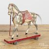 Painted composition horse pull toy, ca. 1900, 8 3/4'' l.