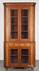 Pennsylvania cherry and tiger maple two-part corner cupboard, ca. 1835, 94 1/2'' h., 44'' w.