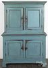 Painted pine two-part cupboard, ca. 1800, retaining a later blue surface, 74 1/2'' h., 49'' w.
