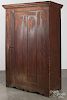 Painted pine wall cupboard, mid 19th c., retaining an old red grained surface, 72 1/2'' h., 42'' w.