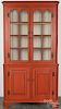 Pennsylvania painted pine and poplar two-part corner cupboard, early 19th c.