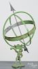 Cast garden armillary, 20th c., with figural strong man support, 30'' h.