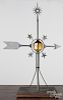 Aluminum weathervane arrow, 20th c., with an octagonal amber colored lightning ball