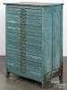 Painted mixed wood printer's cabinet, ca. 1900, having twenty drawers, with a later blue surface