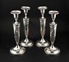 Four Theodore Starr Sterling Silver Candlesticks