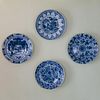 Four Blue and White Delft Plates