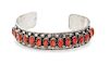 * A Silver and Coral Cuff, Fred Weekoty, Zuni, 17.90 dwts.