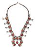 * A Silver and Coral Squash Blossom Necklace, James Valencia, San Felipe Pueblo, 120.20 dwts.