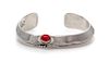 * A Sterling Silver and Coral Cuff Feather Motif Cuff Bracelet, Ben Begay, Navajo, 30.20 dwts.