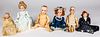 Six bisque head dolls