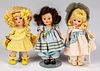 Three hard plastic Vogue dolls