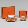 Hermes Porcelain Teacup and Demi Tasse with Saucers in the 'Africa' Pattern