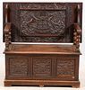 CARVED OAK MONK'S BENCH LATE 19TH/EARLY 20TH C.