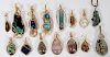 FIFTEEN WIRE GOLD AND STONES PENDANTS