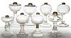 ASSORTED PATTERNED GLASS KEROSENE STAND LAMPS, LOT OF EIGHT