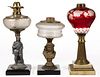 ASSORTED FIGURAL AND OTHER KEROSENE STAND LAMPS, LOT OF THREE